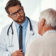 Doctor speaking with an elderly man